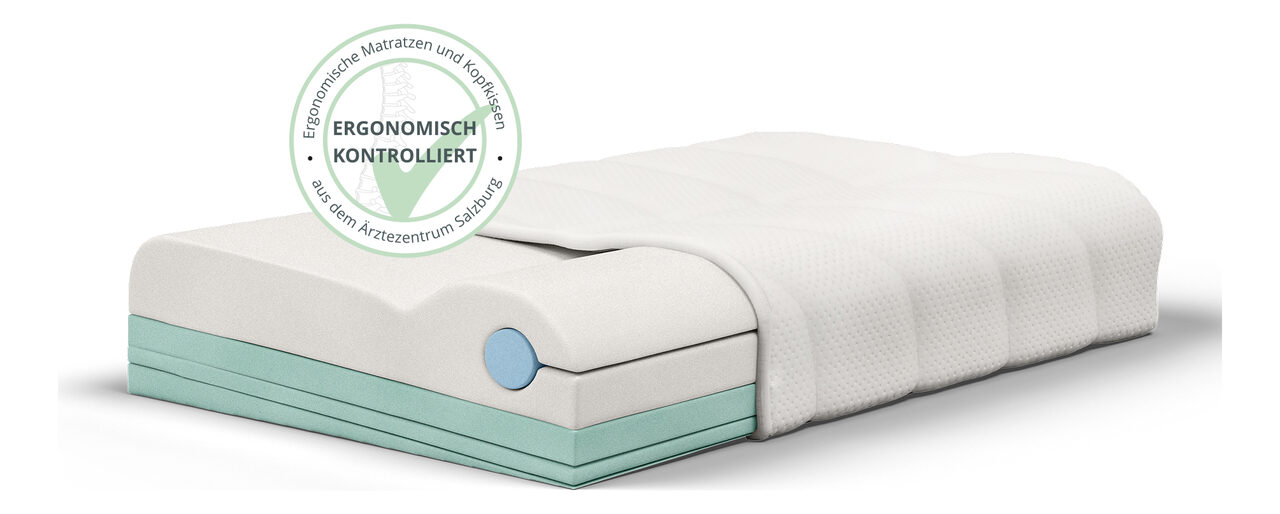 Ergonomie-Kopfkissen mit geöffnetem Bezug und dem Siegel „Ergonomisch kontrolliert“