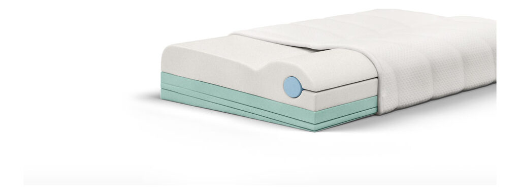Ergonomie-Kopfkissen mit geöffnetem Bezug: Grundmodul, Nackenrolle und Regulierungsplatten